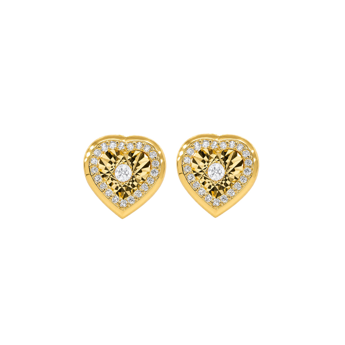 Heart Shaped Diamond Studs in yellow gold by Caleums