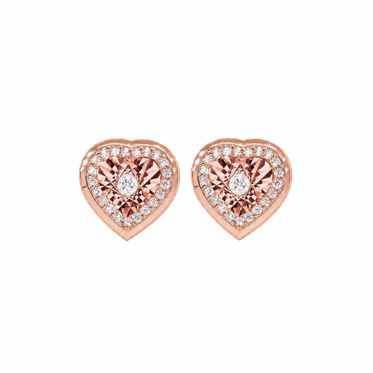 Heart Shaped Diamond Studs in rose gold by Caleums