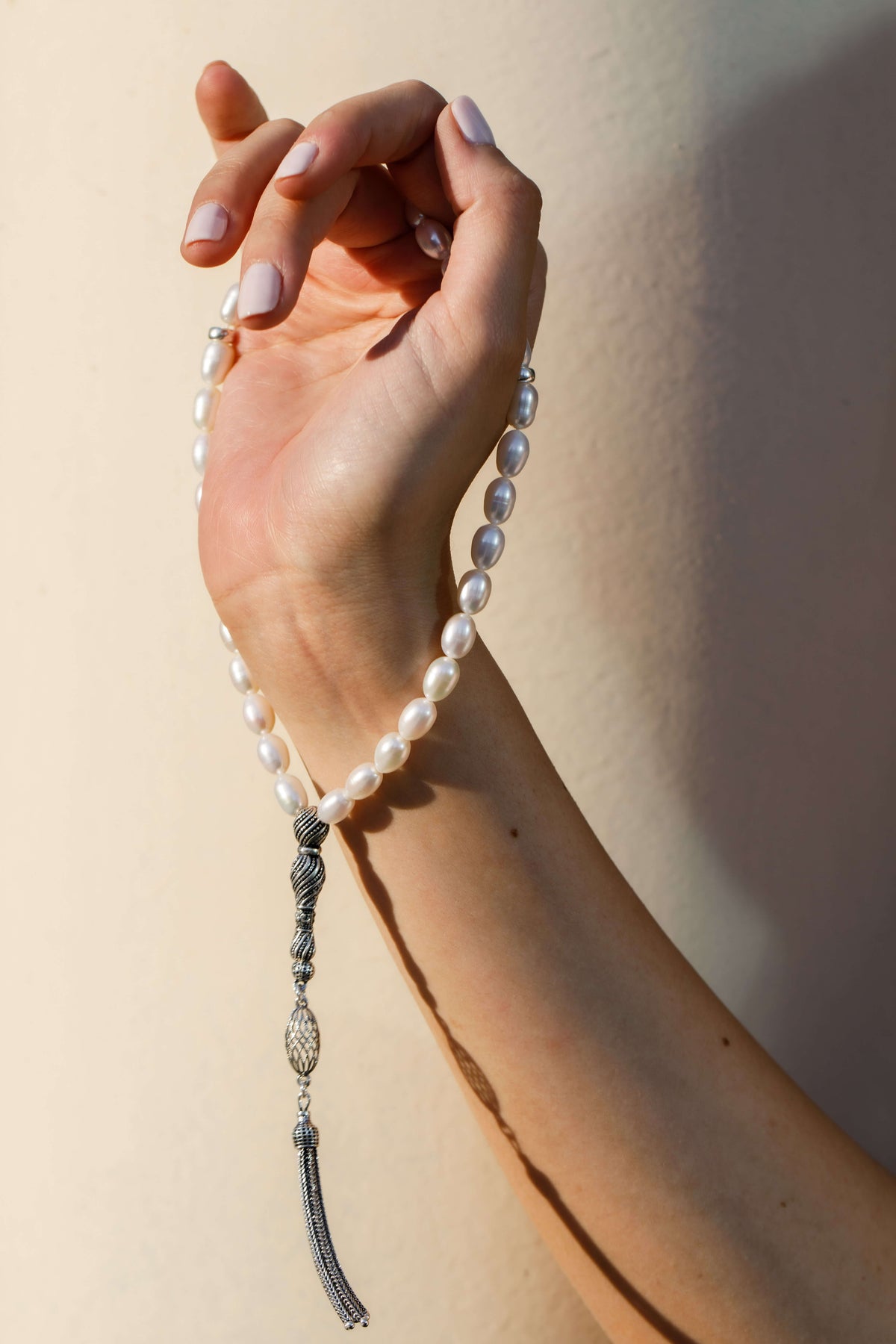 Serenity 33 freshwater pearl prayer beads with an engraved silver tassel