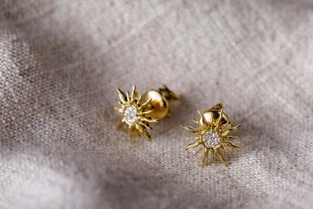 Shams Al Dhahab sun-motif diamond stud earrings in yellow gold