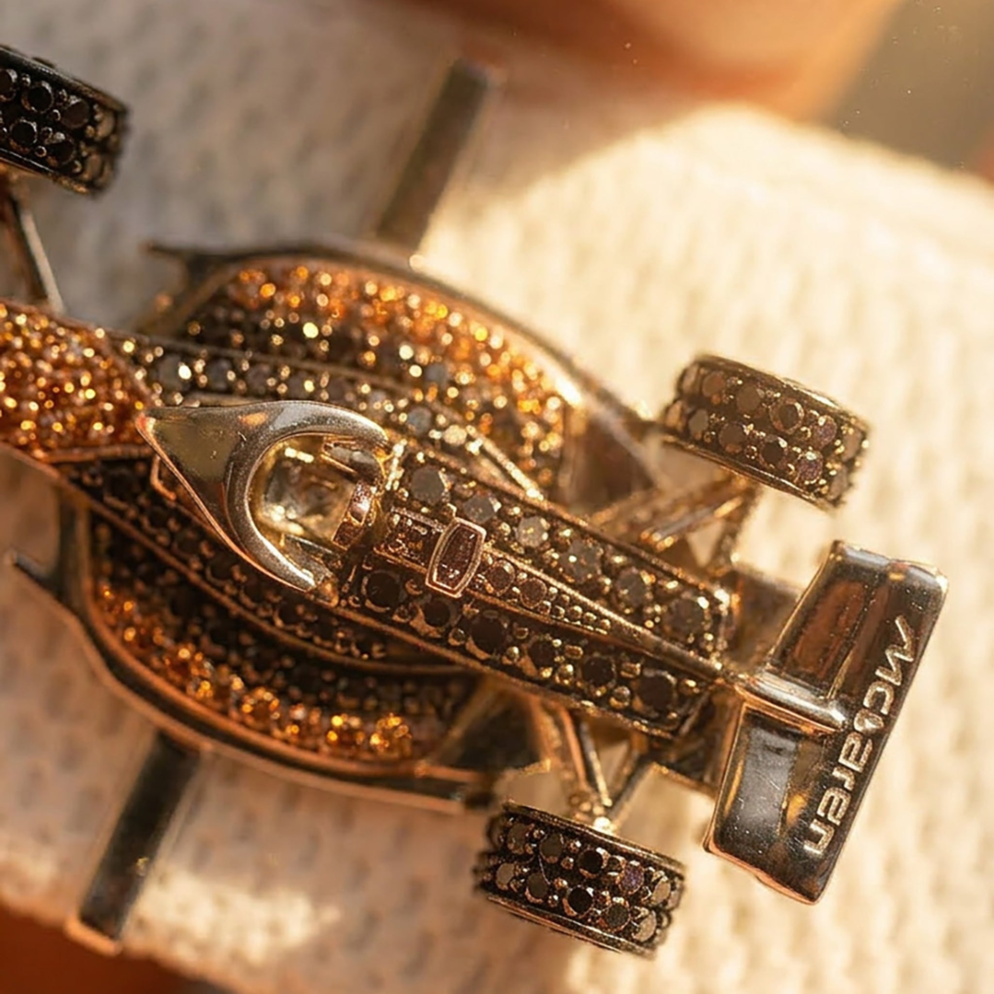 Bespoke McLaren F1 Whoop Accessory | 18K White Gold, Black & Yellow Diamonds