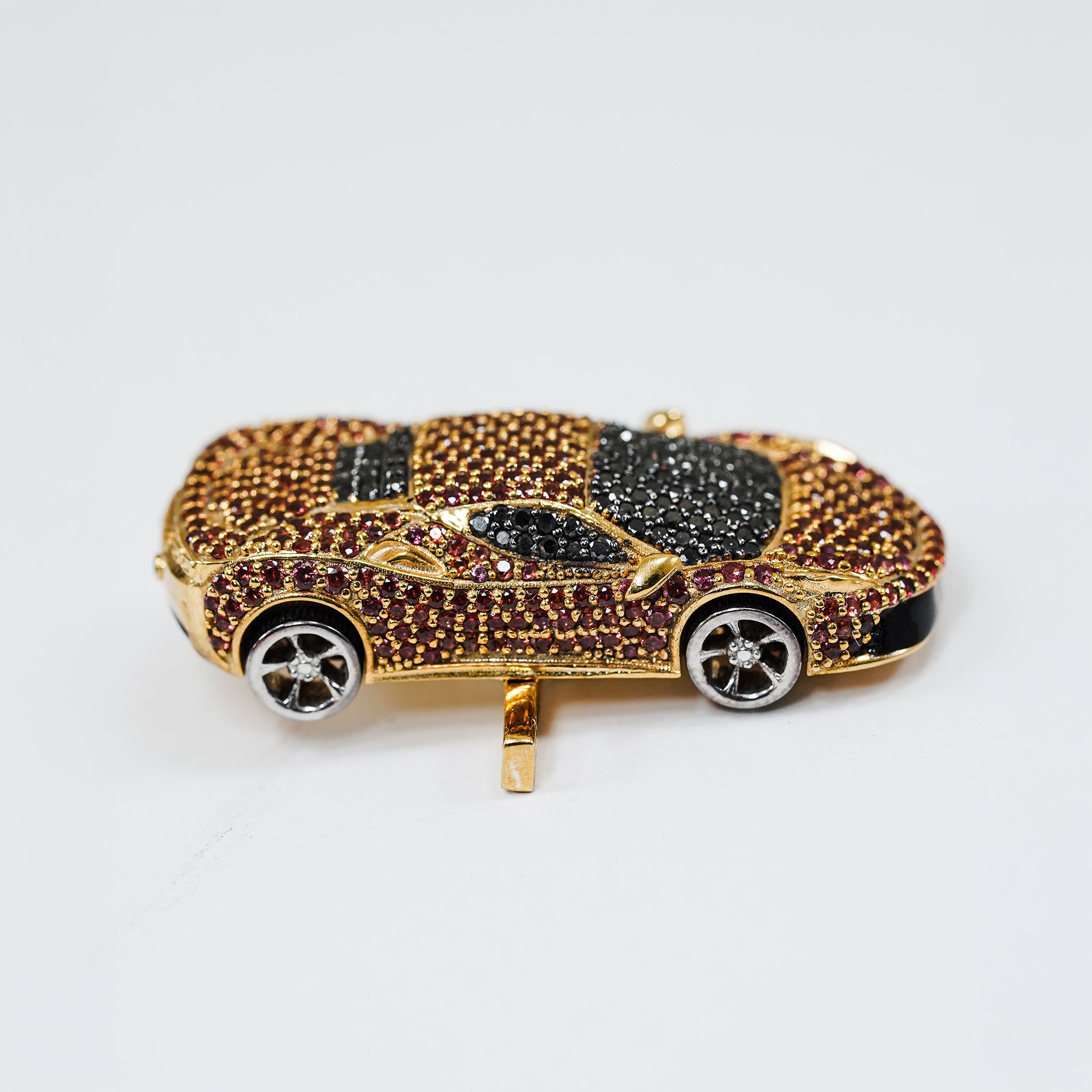 Bespoke Ferrari Whoop Accessory | 18K Yellow Gold, Red Sapphires & Black Diamonds